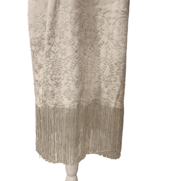 White Dress with Silver Embroidered Pattern and Silver Tassel at Bottom - Picture 9 of 10